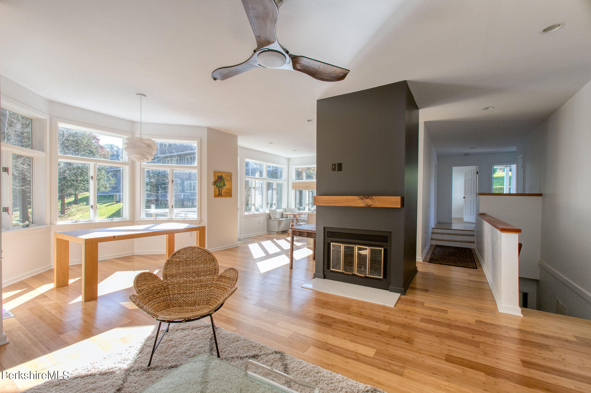 770 Summer Street, Unit 13B Lee, MA 01240 - Photo 2 of 39 a living room with furniture and a fireplace