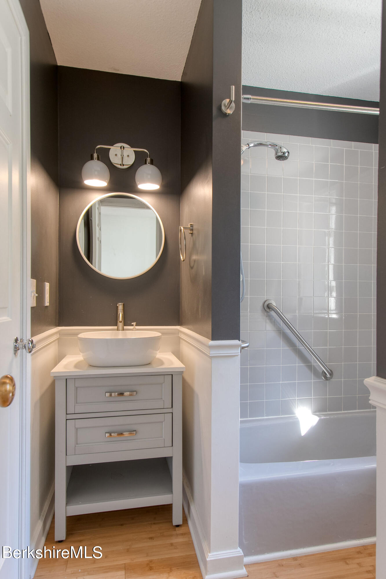 770 Summer Street, Unit 13B Lee, MA 01240 - Photo 19 of 39 a bathroom with a double vanity sink mirror and shower
