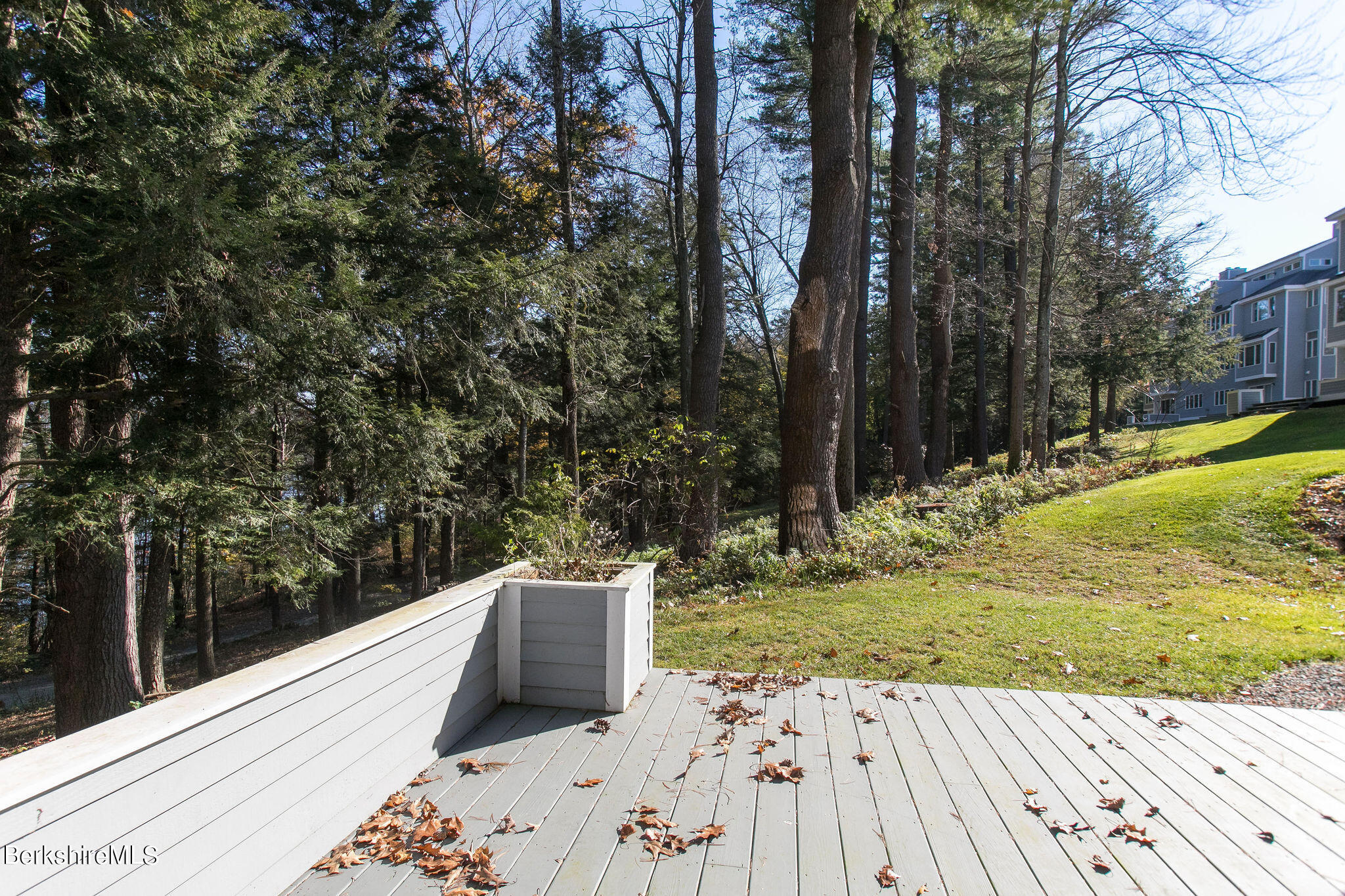 770 Summer Street, Unit 13B Lee, MA 01240 - Photo 24 of 39 a wooden bench sitting in the middle of a yard