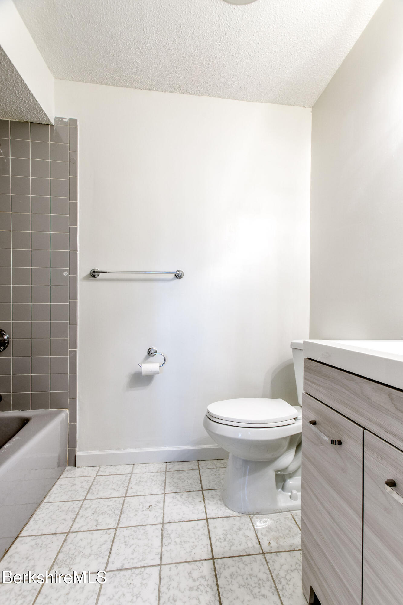 770 Summer Street, Unit 13B Lee, MA 01240 - Photo 30 of 39 a bathroom with a toilet and a shower