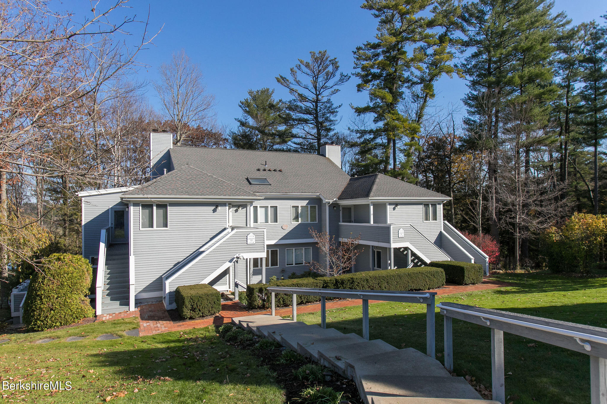 770 Summer Street, Unit 13B Lee, MA 01240 - Photo 38 of 39 a front view of house with yard and green space