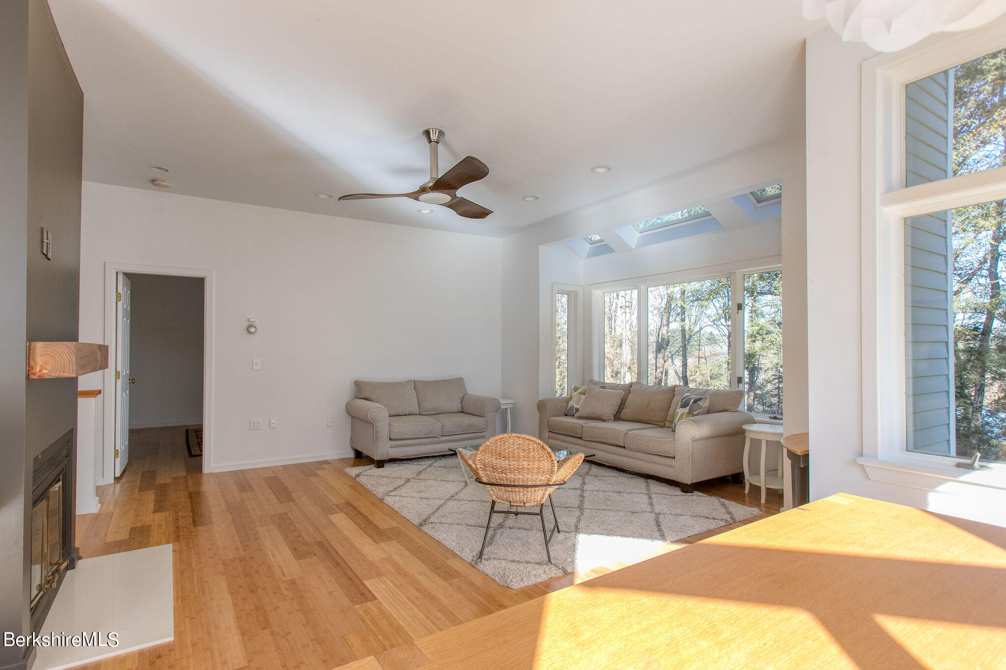 770 Summer Street, Unit 13B Lee, MA 01240 - Photo 9 of 39 a living room with furniture and a large window