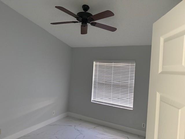 2355 Northwest 123rd Avenue Coral Springs, FL 33065 - Photo 5 of 10 a view of an empty room with a window