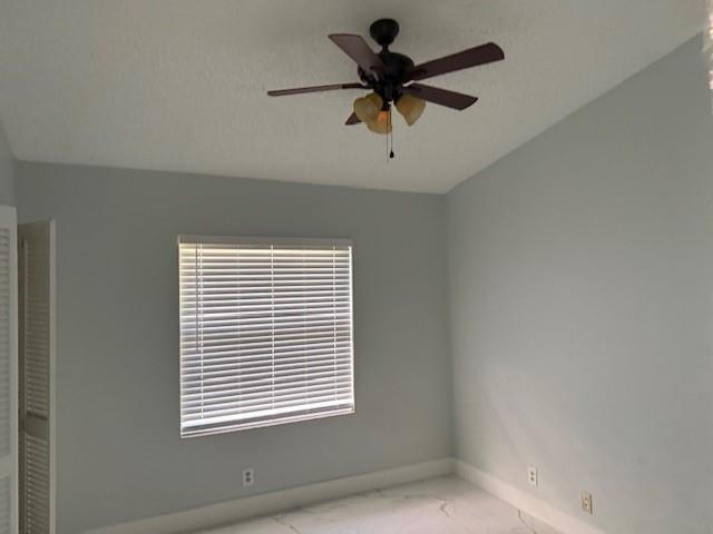 2355 Northwest 123rd Avenue Coral Springs, FL 33065 - Photo 7 of 10 a view of a room with a window and a ceiling fan
