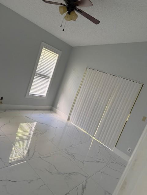 2355 Northwest 123rd Avenue Coral Springs, FL 33065 - Photo 8 of 10 a view of an empty room with a window