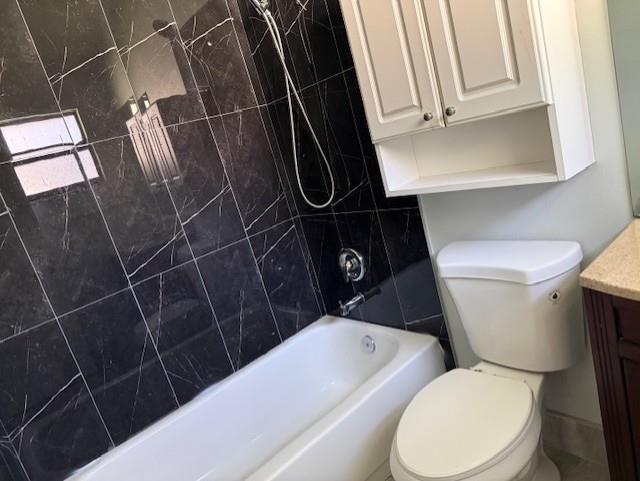 2355 Northwest 123rd Avenue Coral Springs, FL 33065 - Photo 9 of 10 a white toilet sitting next to a sink