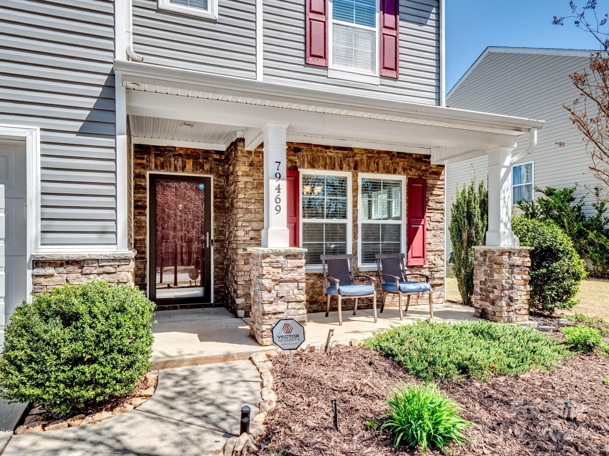 79469 Ridgehaven Road Lancaster, SC 29720 - Photo 5 of 35 a front view of a house with outdoor seating