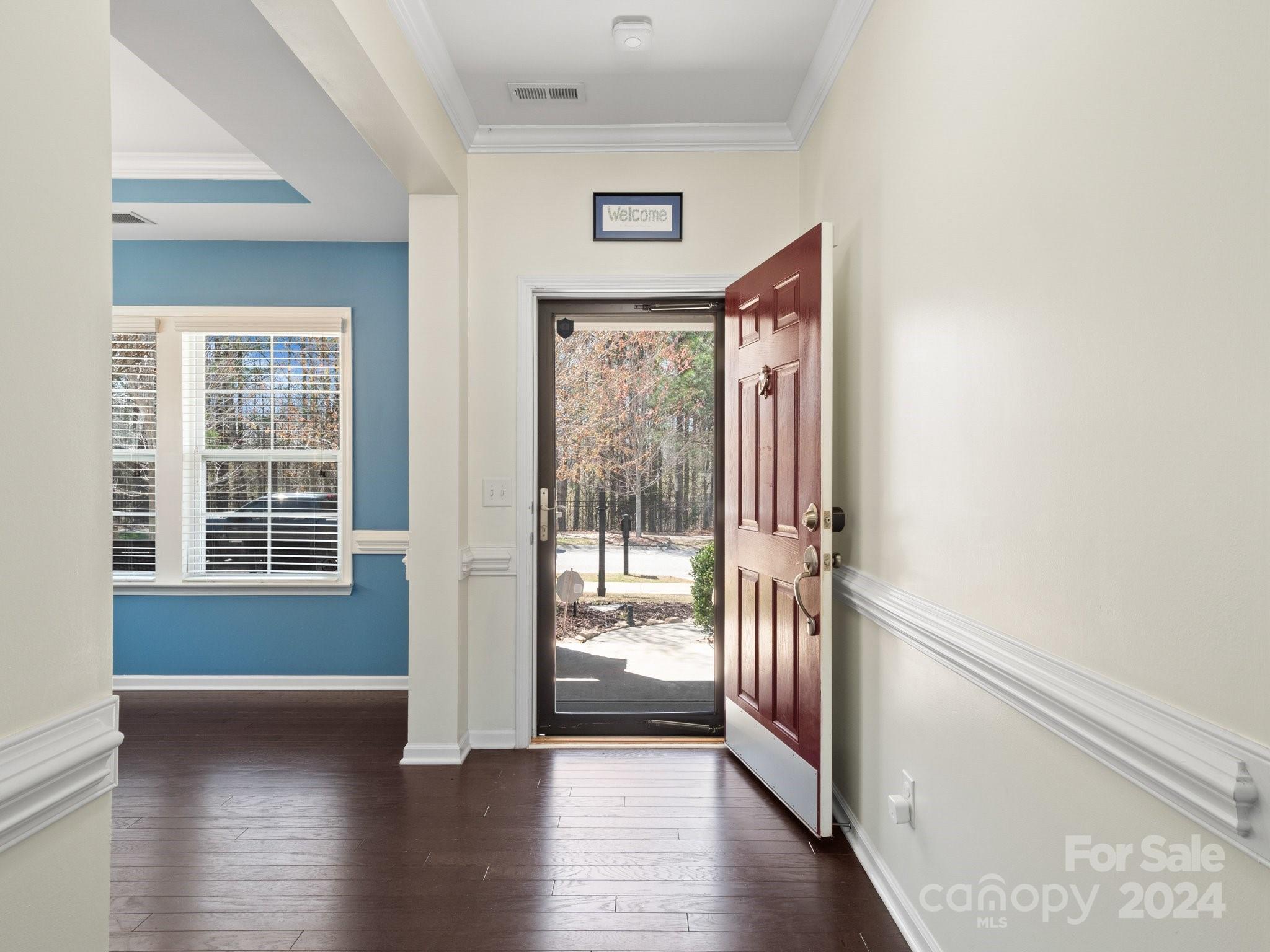 79469 Ridgehaven Road Lancaster, SC 29720 - Photo 7 of 35 a view of an entryway with wooden floor and door