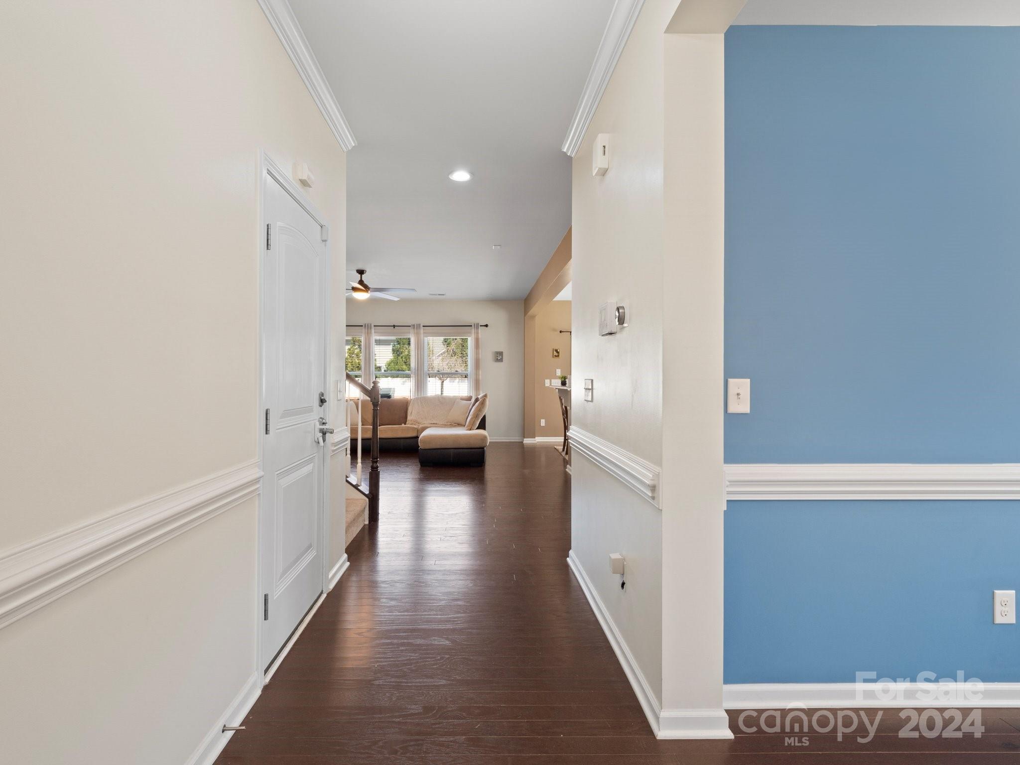 79469 Ridgehaven Road Lancaster, SC 29720 - Photo 8 of 35 a view of a hallway view with wooden floor and living room