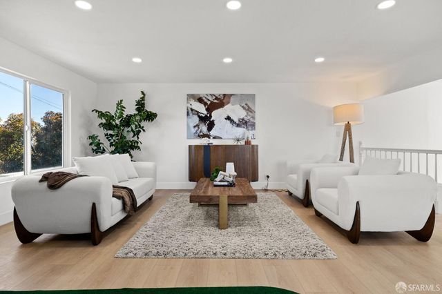 a living room with furniture and a couch