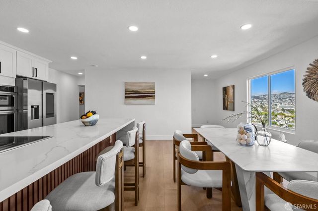a view of a dining room with furniture