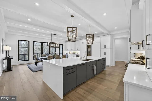 a view of a hallway with the wooden floor and staircase