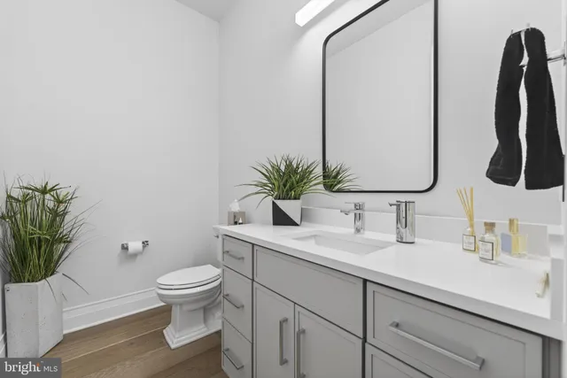 a spacious bedroom with a bed window and a table