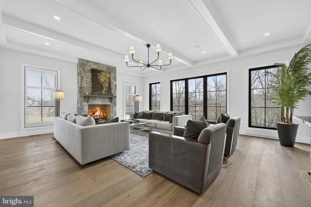 a view of a room with wooden floor and stairs