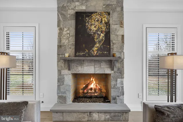 a view of a room with stairs and a wooden floor