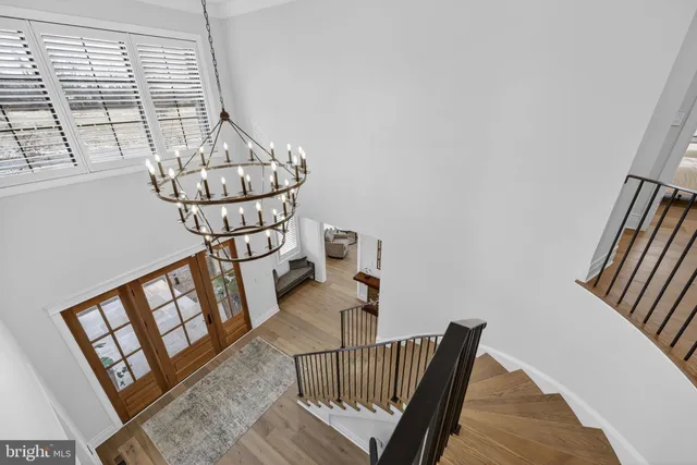 a view of a room with large windows