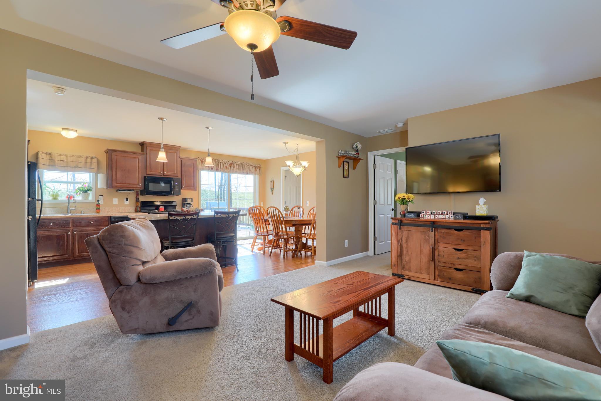 695 Forest Road Denver, PA 17517 - Photo 8 of 38 Open concept living room to kitchen view
