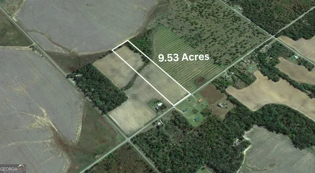 a view of a swimming pool with a yard