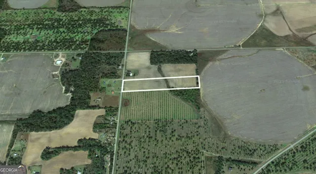 a view of a swimming pool and a yard