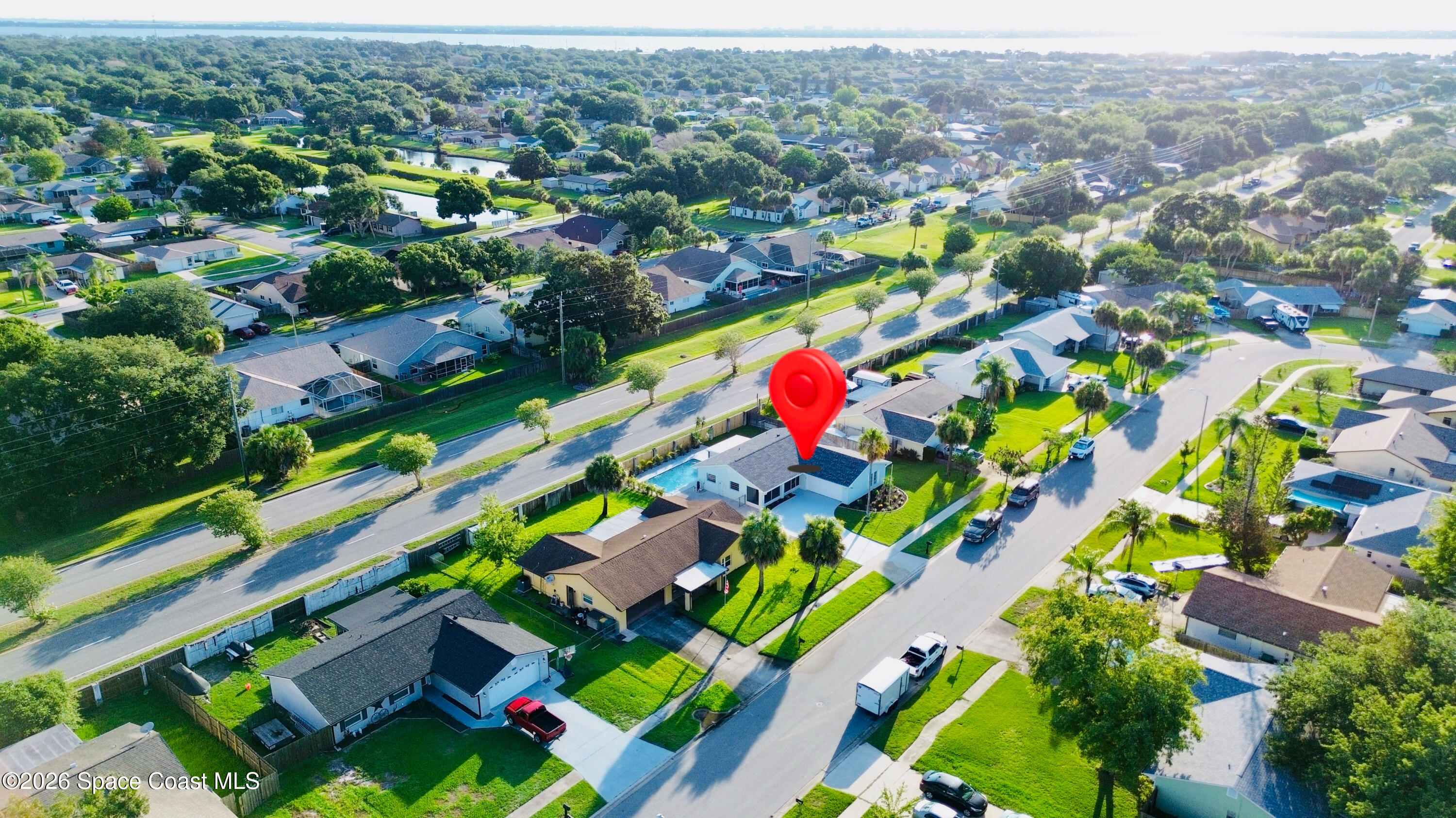 1910 Tallridge Road Melbourne, FL 32935 - Photo 31 of 34 drone 4 2