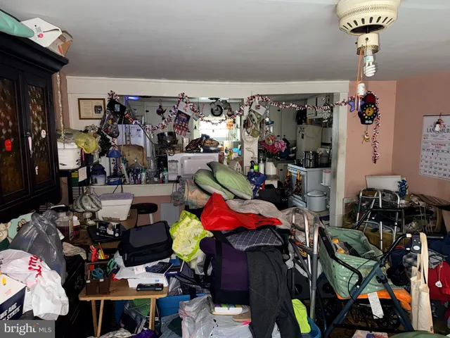 a kitchen with a sink a stove and cabinets
