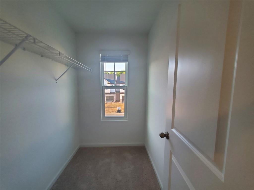 5745 Thornton Drive Cumming, GA 30028 - Photo 27 of 45 a view of an empty room with a window