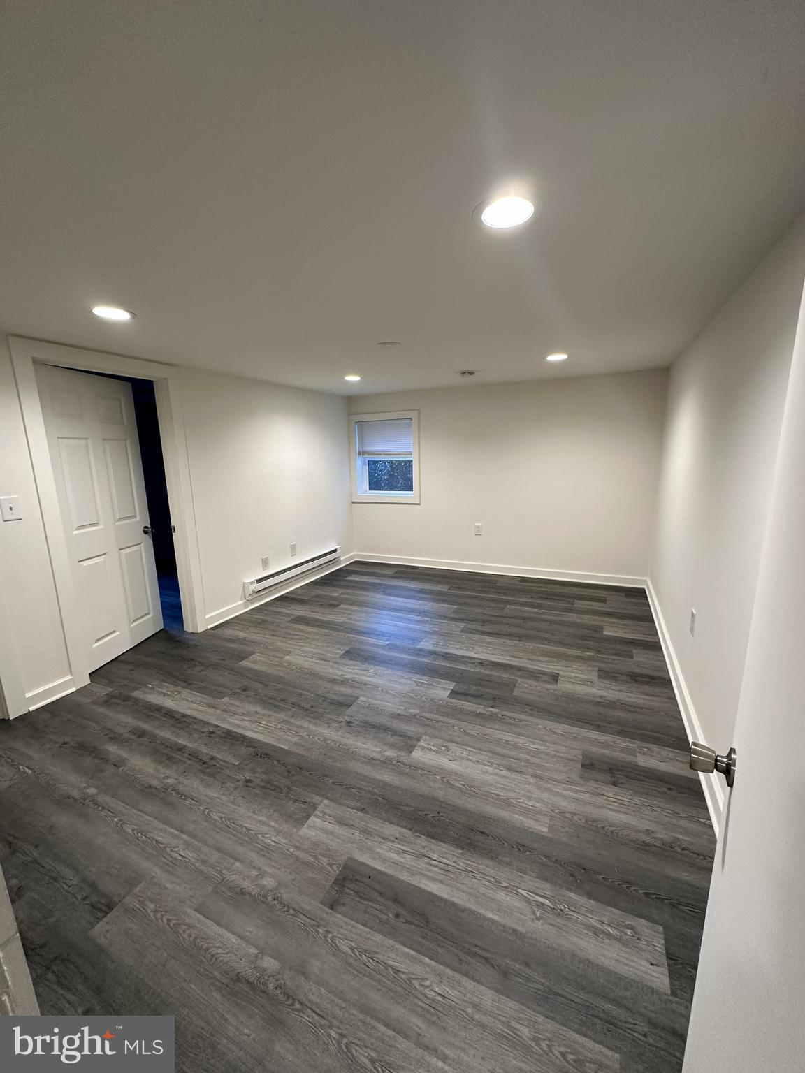 45 Warrenton Road, Unit 2 Fredericksburg, VA 22405 - Photo 6 of 8 a view of an empty room with wooden floor