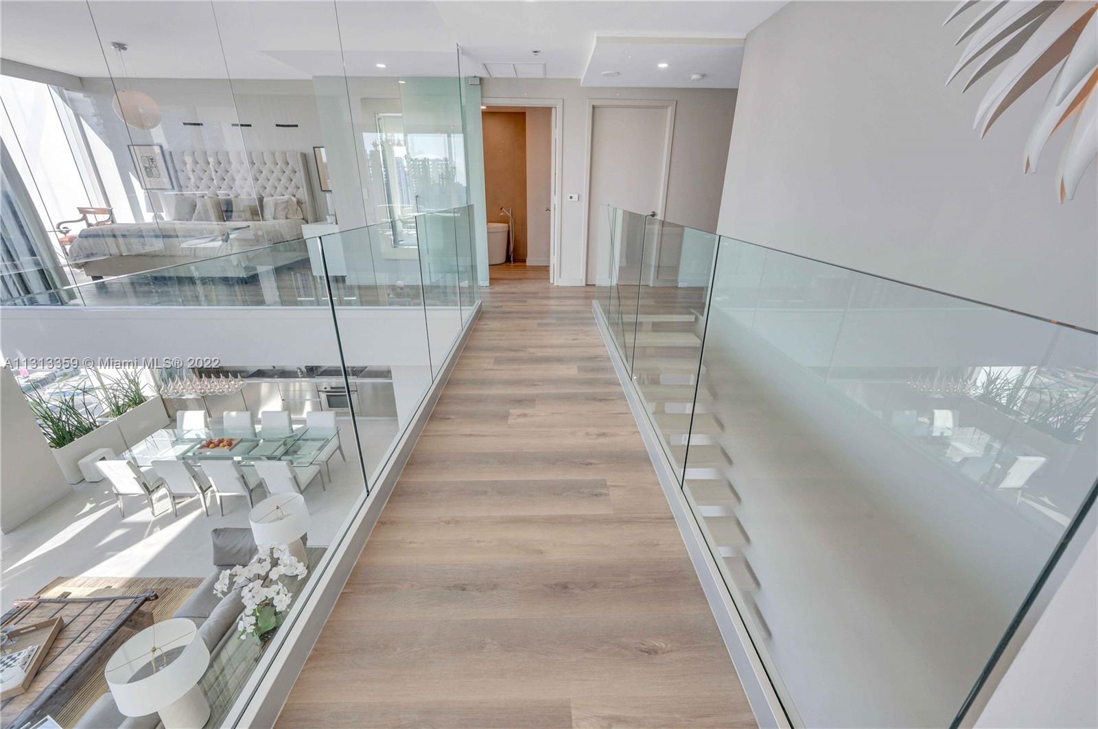 1040 Biscayne Boulevard, Unit PH4407 Miami, FL 33132 - Photo 29 of 74 a view of entryway and hall with wooden floor