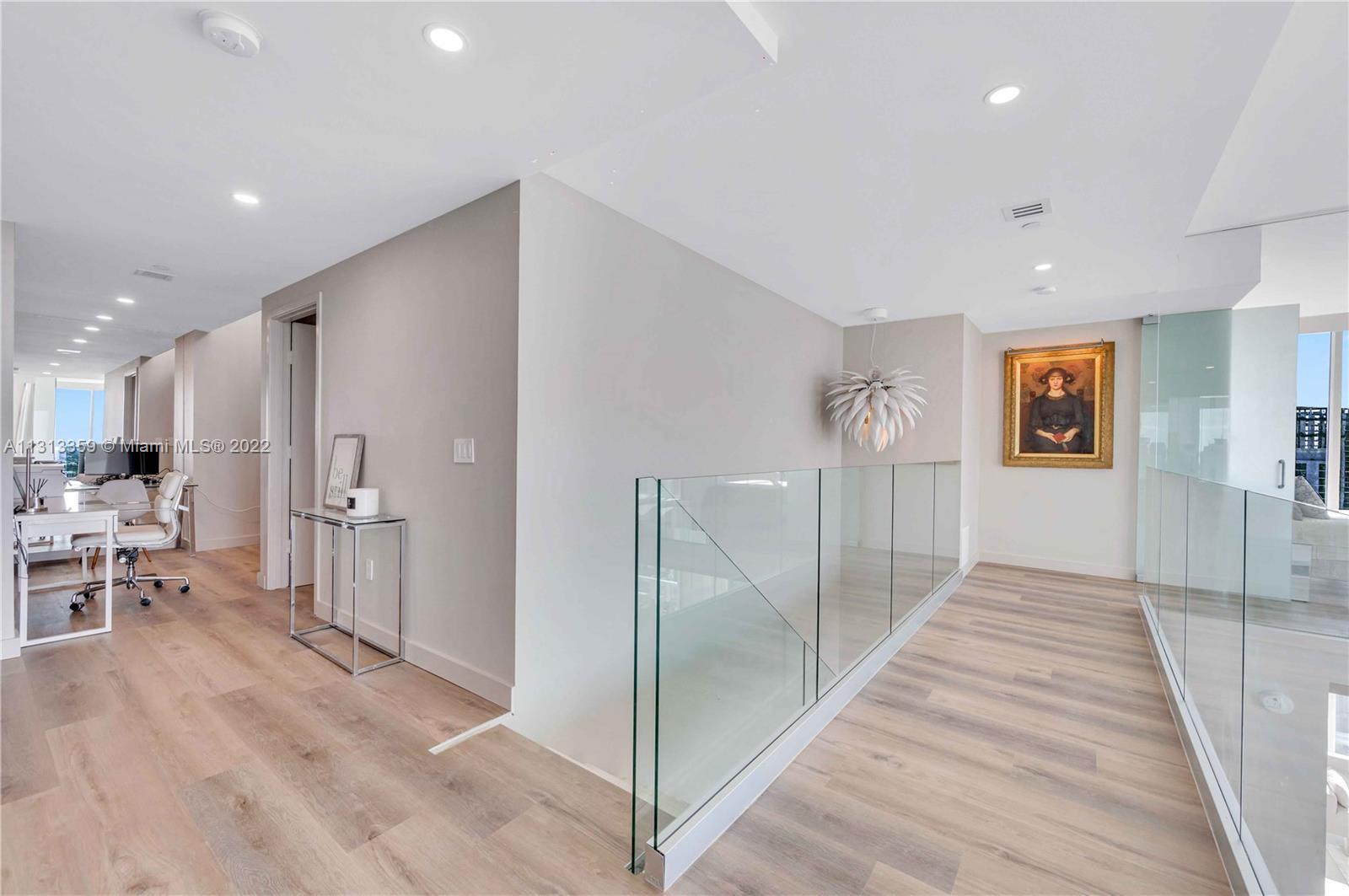 1040 Biscayne Boulevard, Unit PH4407 Miami, FL 33132 - Photo 32 of 74 a view of a hallway with furniture