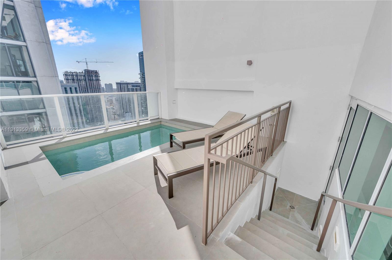 1040 Biscayne Boulevard, Unit PH4407 Miami, FL 33132 - Photo 56 of 74 a view of balcony and furniture