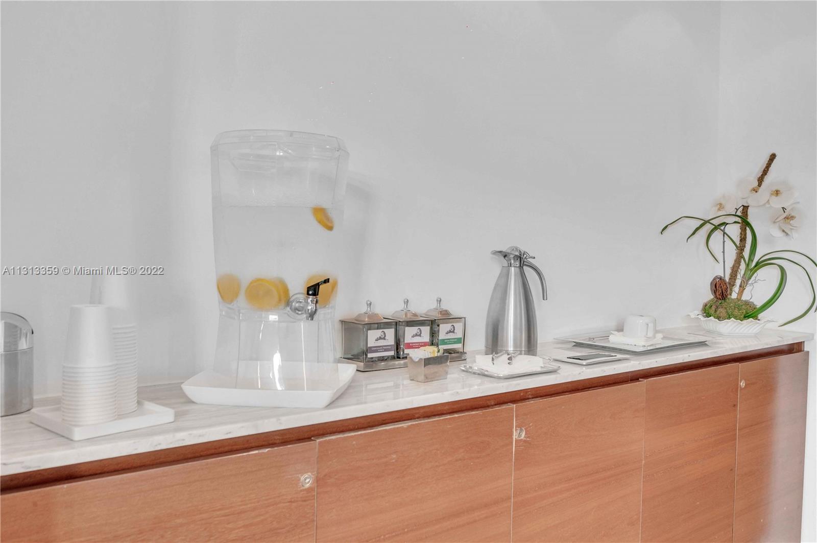 1040 Biscayne Boulevard, Unit PH4407 Miami, FL 33132 - Photo 66 of 74 a kitchen with a faucet a sink and a counter top space