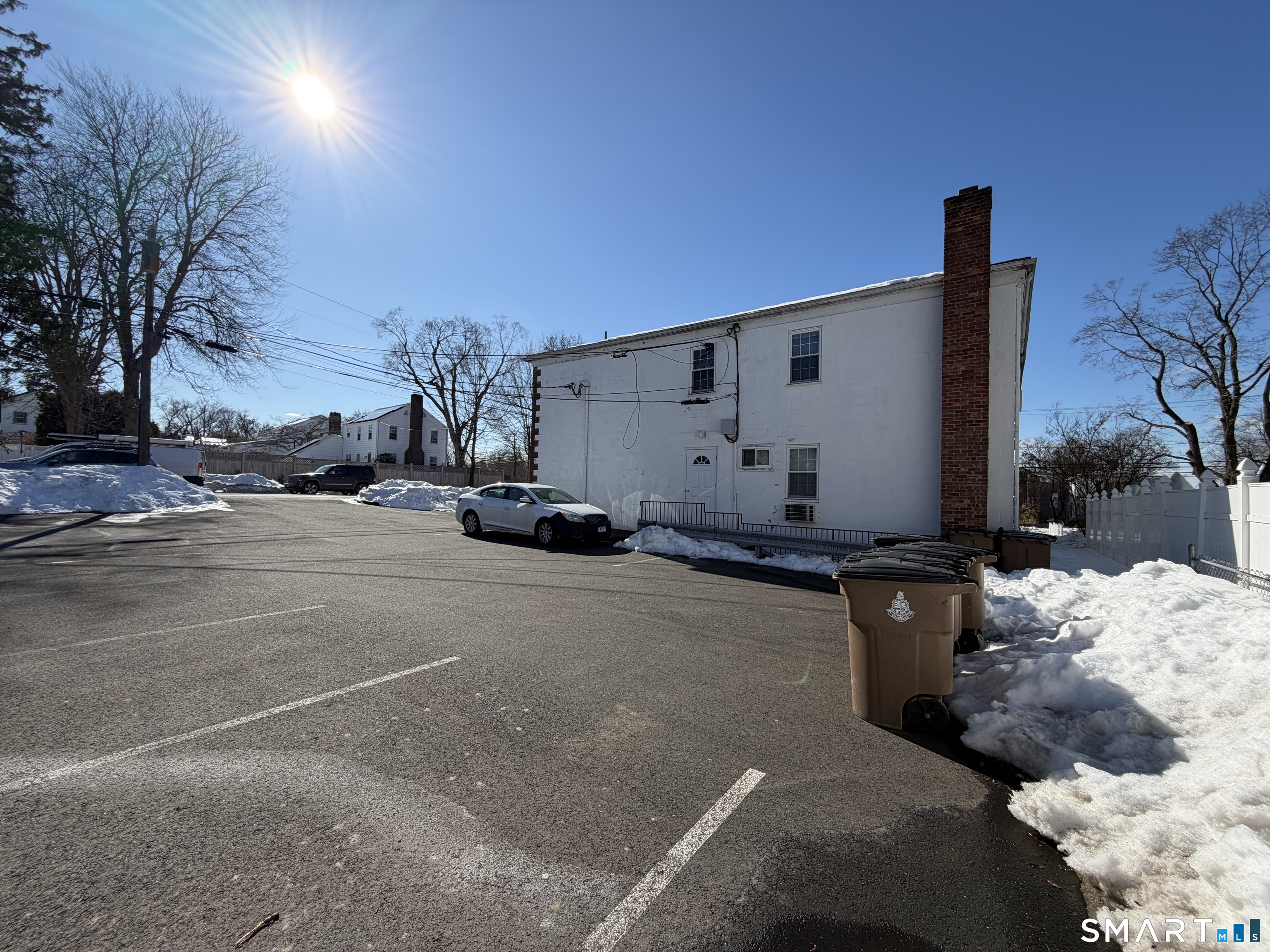 11 Belltown Road, Unit 1 Stamford, CT 06905 - Photo 9 of 10 a view of back yard of the house