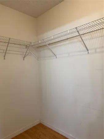 a view of a room with racks on the wall