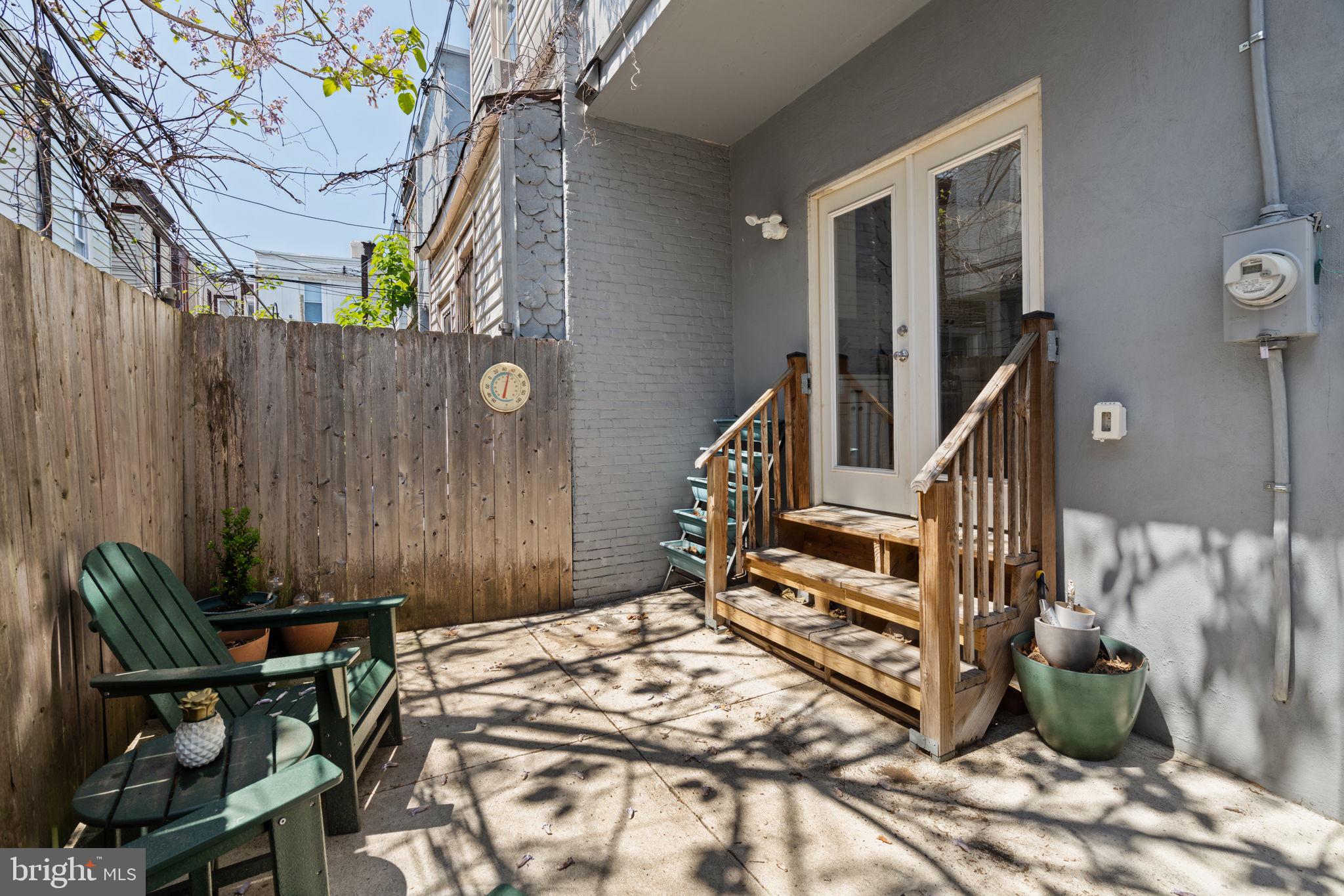 2934 Nicholas Street Philadelphia, PA 19121 - Photo 12 of 33 a view of staircase with wooden floor and chair