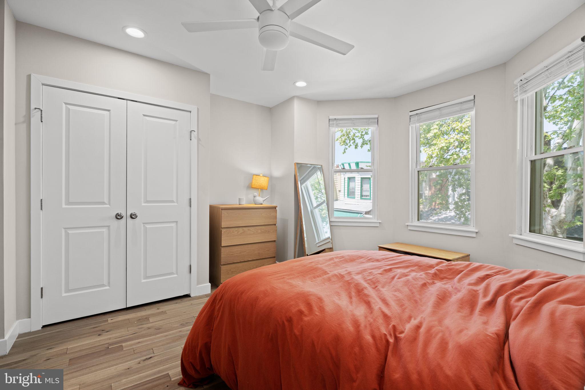 2934 Nicholas Street Philadelphia, PA 19121 - Photo 24 of 33 a spacious bedroom with a bed and a window