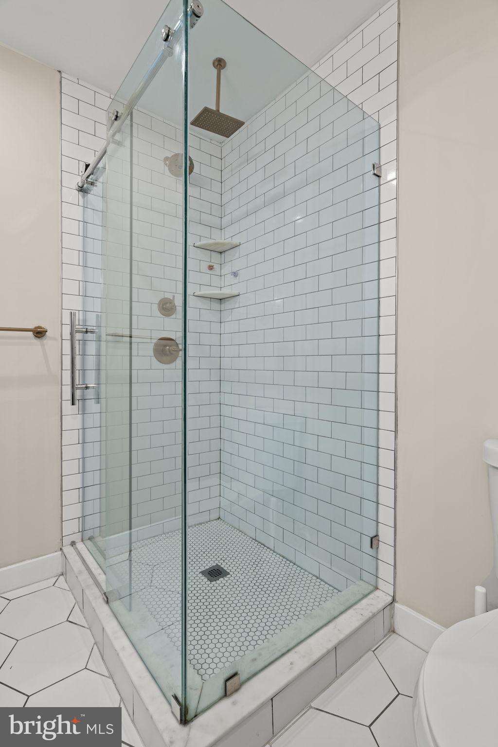 2934 Nicholas Street Philadelphia, PA 19121 - Photo 27 of 33 a bathroom with a shower