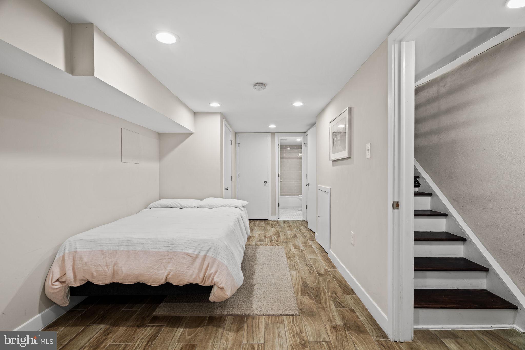 2934 Nicholas Street Philadelphia, PA 19121 - Photo 28 of 33 a bed room with a bed and a view of bedroom
