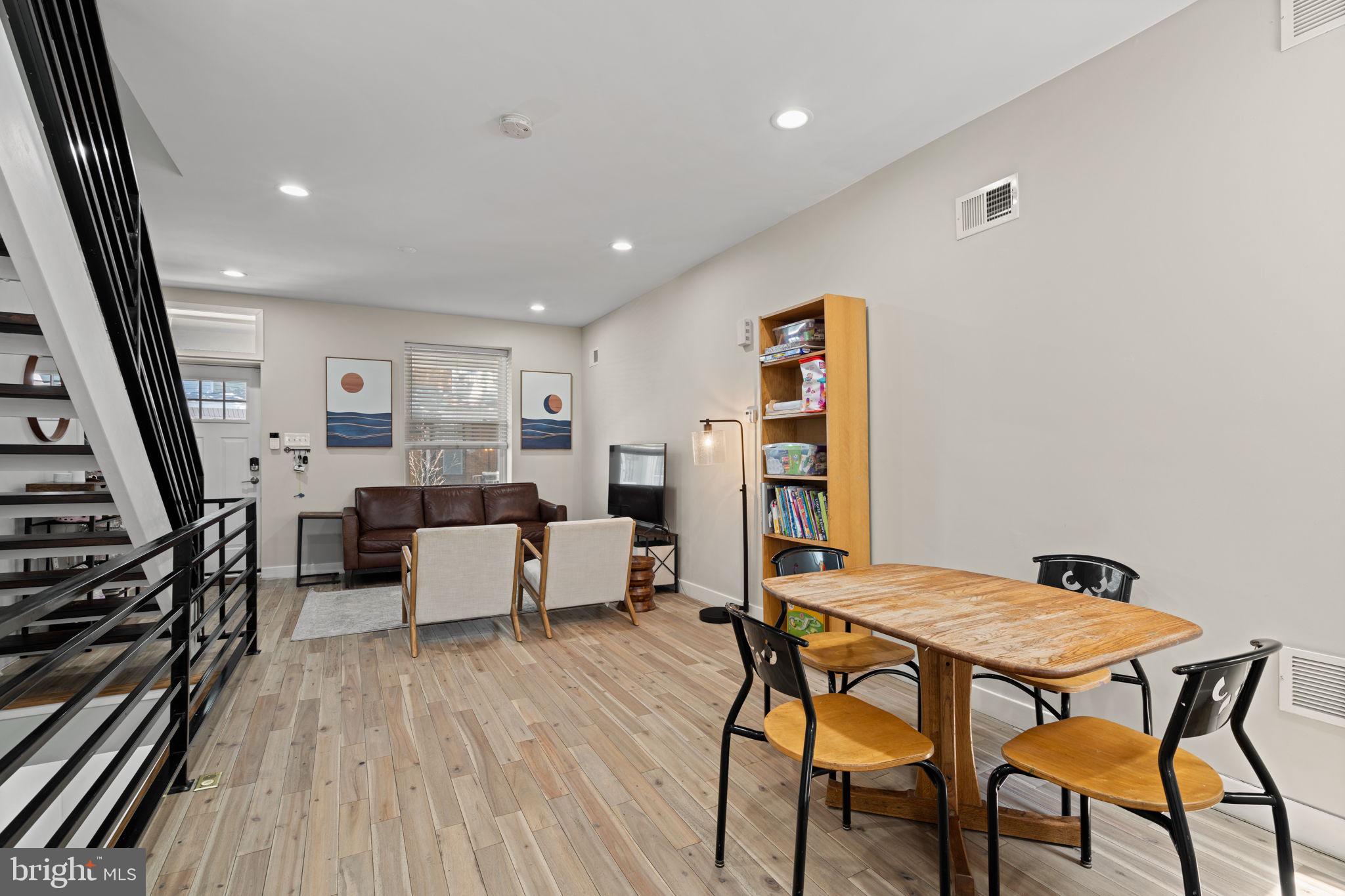 2934 Nicholas Street Philadelphia, PA 19121 - Photo 6 of 33 a living room with furniture and a wooden floor