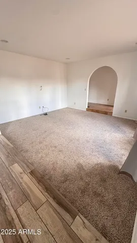 a view of a room with an empty space