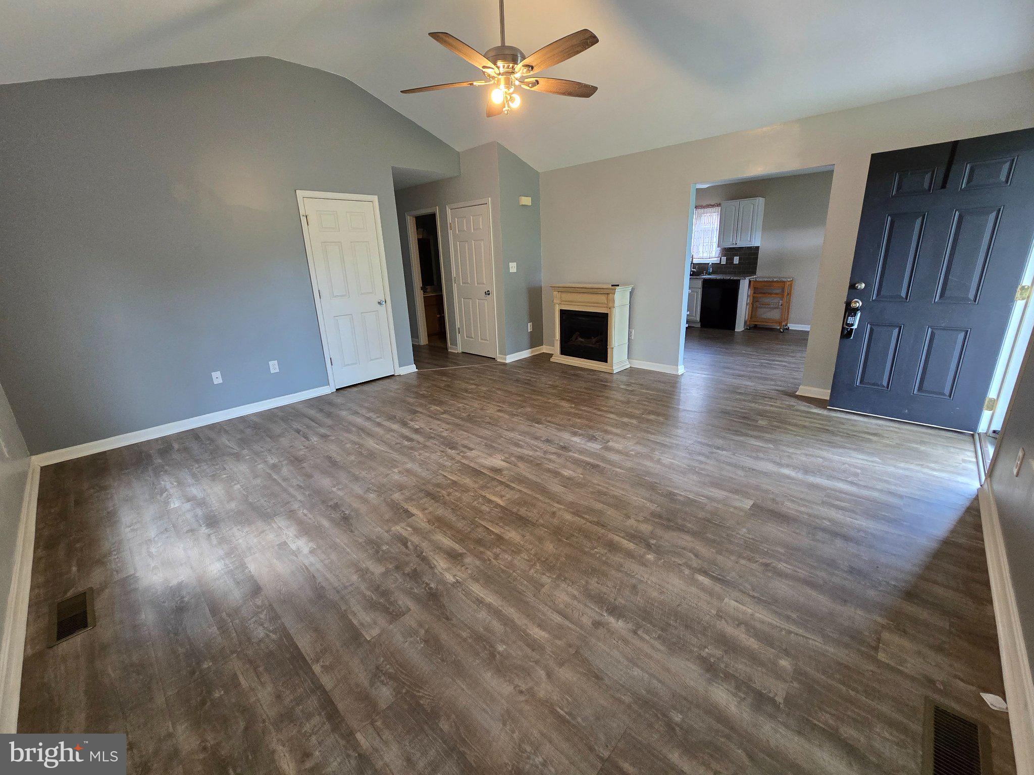 8981 Sharptown Road Laurel, DE 19956 - Photo 9 of 34 Spacious living area with modern charm.