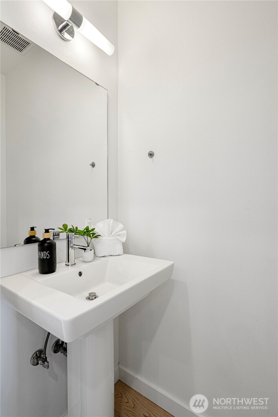 1546 Sturgus Avenue South Seattle, WA 98144 - Photo 14 of 23 a bathroom with a sink and a mirror