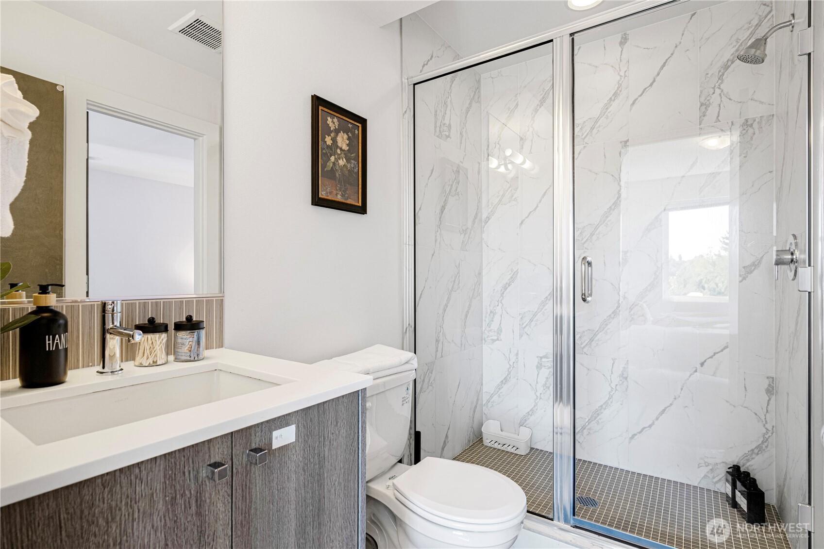 1546 Sturgus Avenue South Seattle, WA 98144 - Photo 10 of 23 a bathroom with a sink a toilet and shower