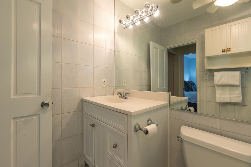 804 South Street, Unit 3 Key West, FL 33040 - Photo 12 of 22 a bathroom with a sink a toilet and shower