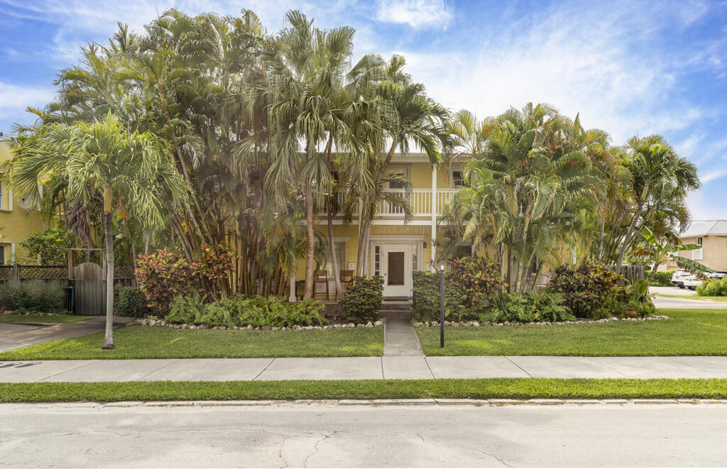 804 South Street, Unit 3 Key West, FL 33040 - Photo 2 of 22 a front view of a house with a yard