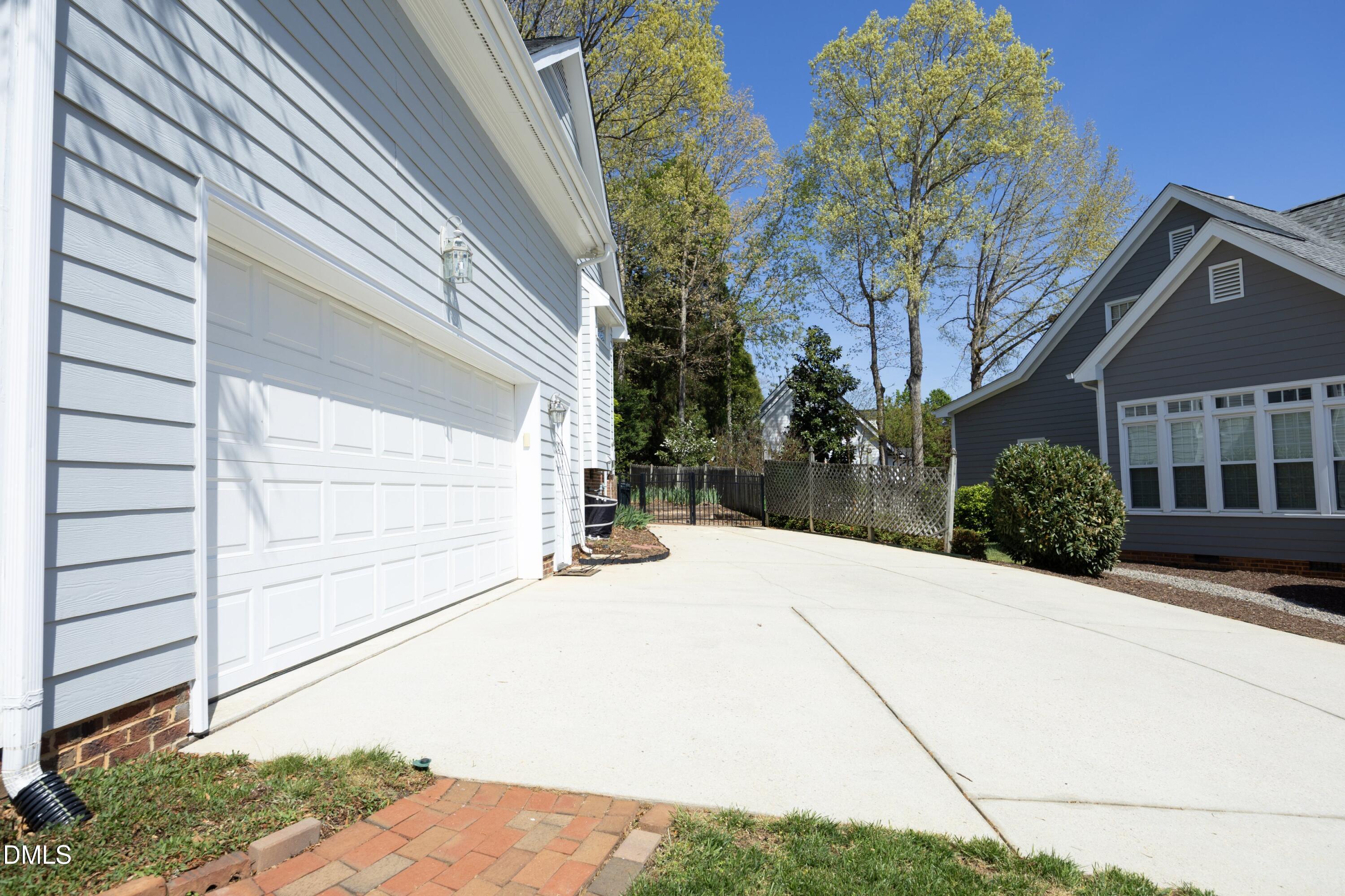 1427 Moosecreek Drive Raleigh, NC 27614 - Photo 4 of 51 a house view with a outdoor space