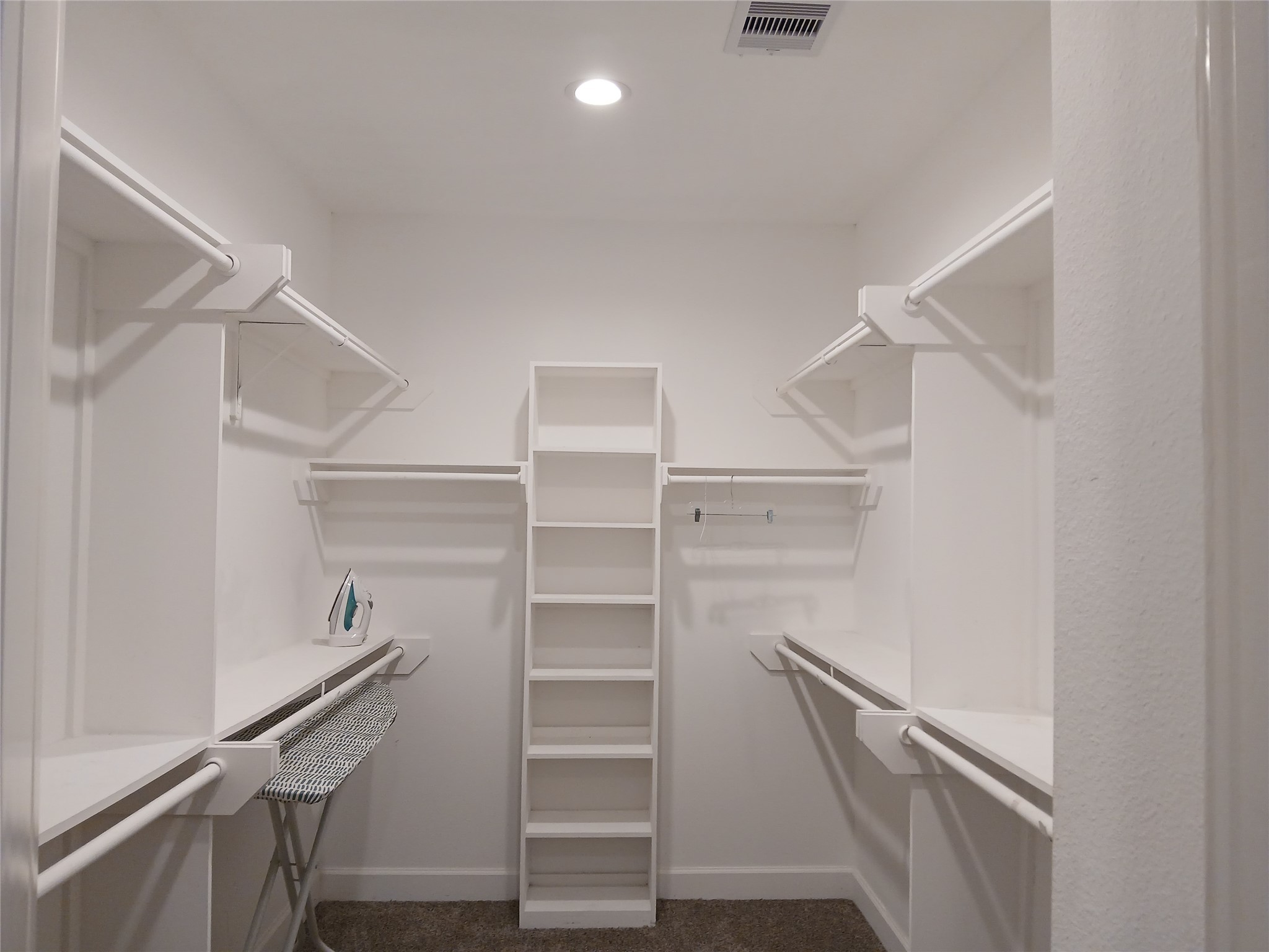 3333 Kilgore Street Houston, TX 77021 - Photo 21 of 35 a view of walk in closet with empty racks