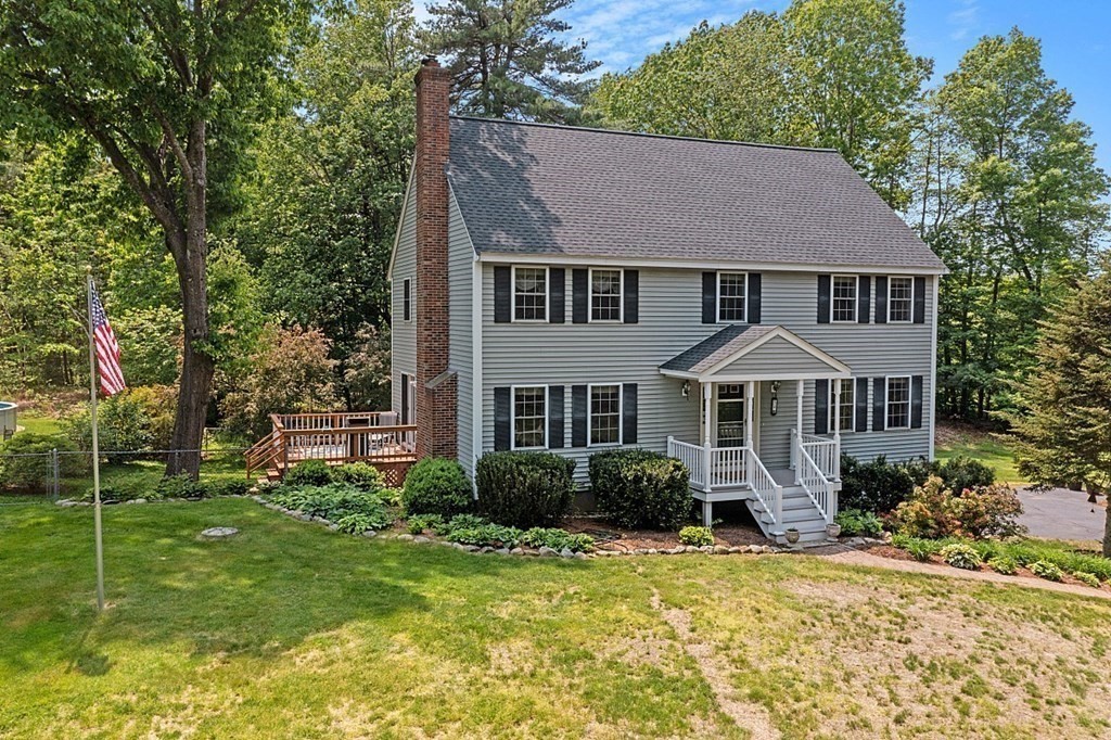 54 Little Turnpike Road Shirley, MA 01464 - Photo 38 of 39 a front view of a house with a garden