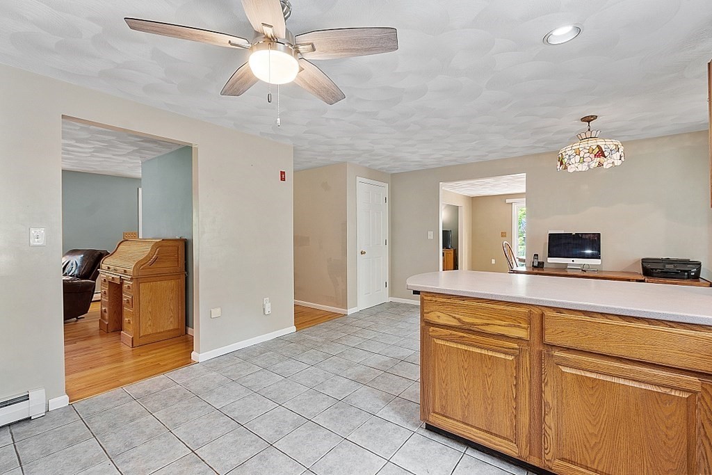 54 Little Turnpike Road Shirley, MA 01464 - Photo 4 of 39 a view of a kitchen from the hallway