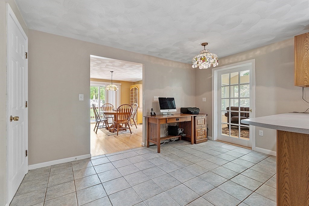 54 Little Turnpike Road Shirley, MA 01464 - Photo 7 of 39 a view of kitchen with sink and refrigerator