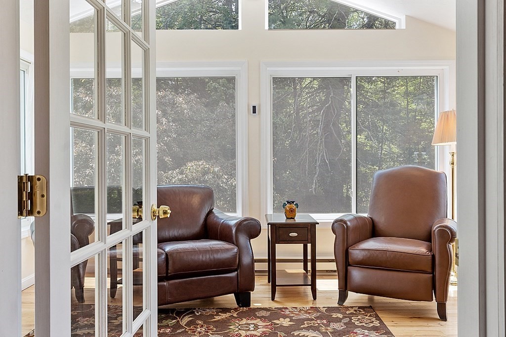54 Little Turnpike Road Shirley, MA 01464 - Photo 8 of 39 a outdoor living room with furniture and a window